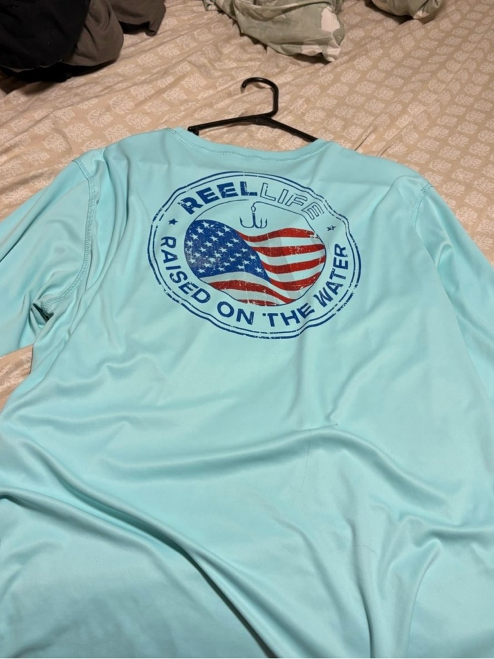 Reel Life Women’s Light Blue 'Raised on the Water' Performance Tee